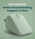 A light sage green wedge breastfeeding support pillow shown on a matching sage green background with promotional text reading 'MEET THE WEDGE Better Breastfeeding Support Is Here'.
